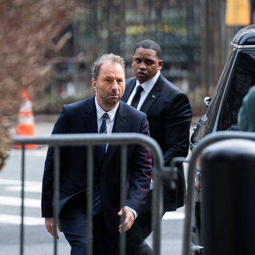 Michael Rapino, left, chief executive officer and president of Live Nation Entertainment Inc., arrives at Manhattan Federal court, Thursday, March 19, 2026 in New York. (AP Photo/Adam Gray)