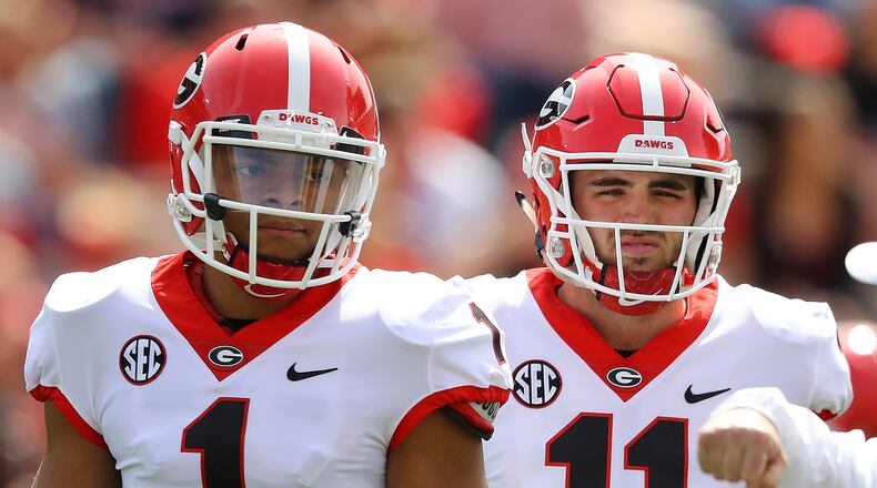 UGA quarterbacks Justin Fields and Jake Fromm. Curtis Compton/ccompton@ajc.com