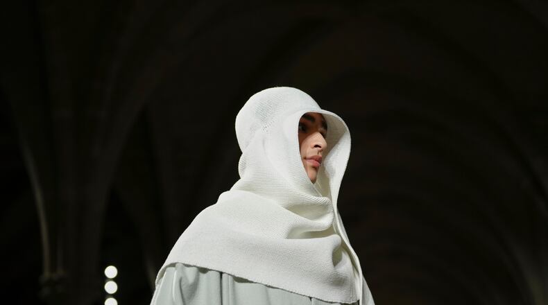 A model wears a creation as part of the Issey Miyake Fall/Winter 2026-2027 Men's collection presented in Paris, Thursday, Jan. 22, 2026. (AP Photo/Aurelien Morissard)