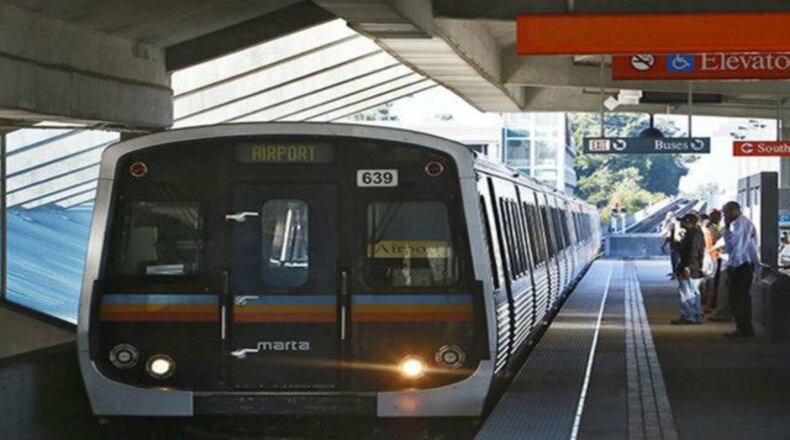 Travelers await to board a MARTA train.