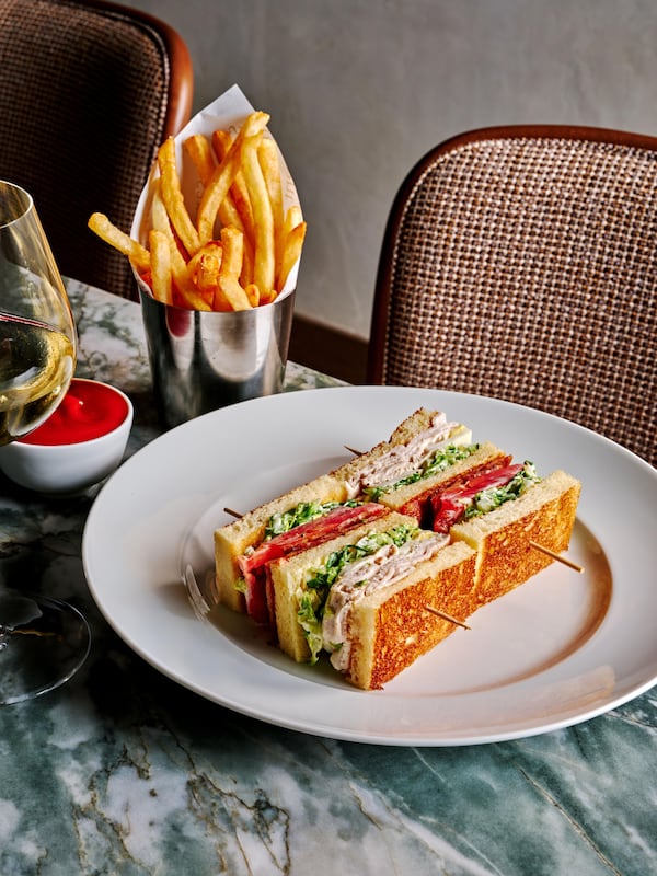 Sargent’s menu includes dishes the owners would want to eat themselves, like the club sandwich with fries. (Courtesy of Andrew Thomas Lee)