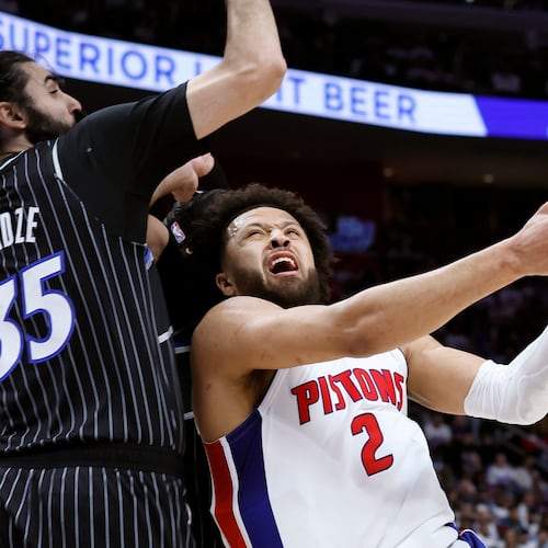 Detroit Pistons guard Cade Cunningham (2) goes to the basket against Orlando Magic center Goga Bitadze (35) during the first half in Game 1 of a first-round NBA basketball playoffs series Sunday, April 19, 2026, in Detroit. (AP Photo/Duane Burleson)