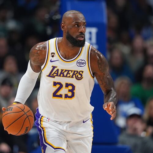 Los Angeles Lakers forward LeBron James dribbles the ball up court against the Dallas Mavericks during the first half of an NBA basketball game Saturday, Jan. 24, 2026, in Dallas. (AP Photo/Julio Cortez)