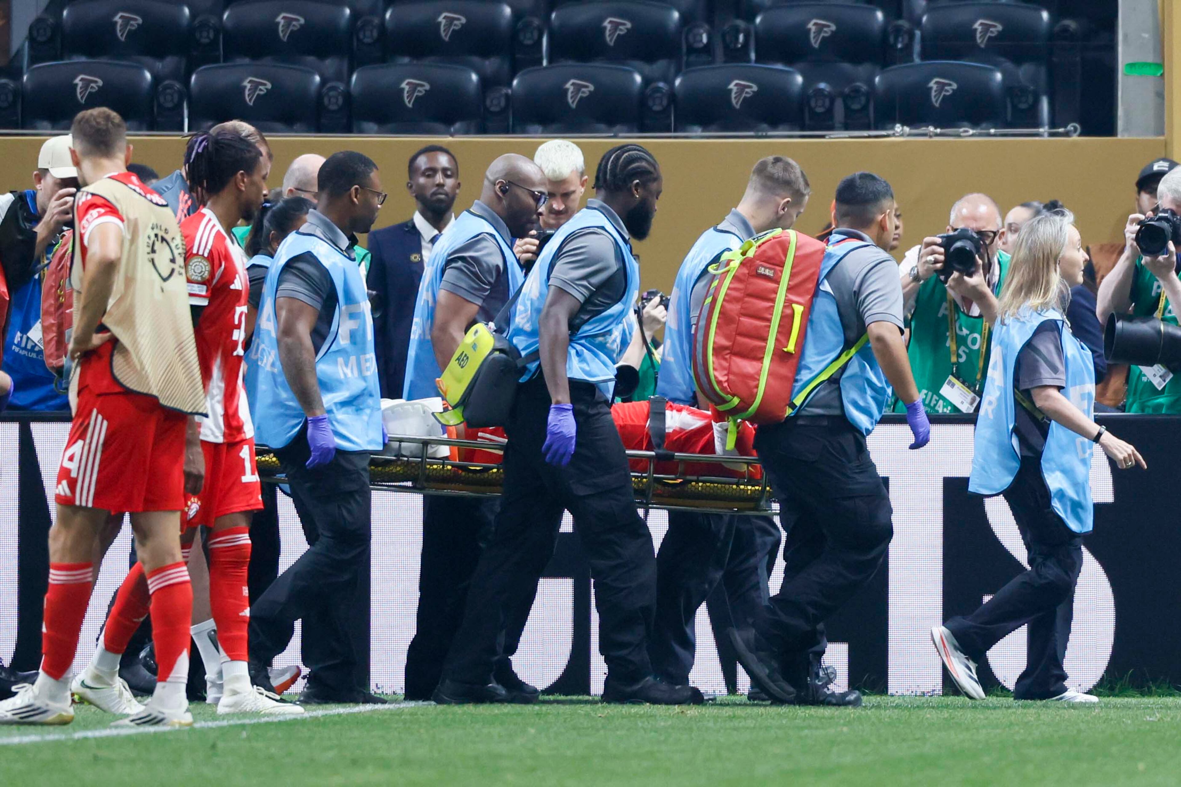 Bayern Munich midfielder Jamal Musiala (42) leaves the field on a stretcher after a horrendous injury during the Club World Cup quarterfinal soccer match between Paris Saint-Germain and Bayern Munich, Saturday, July 5, 2025.
(Miguel Martinez/ AJC)