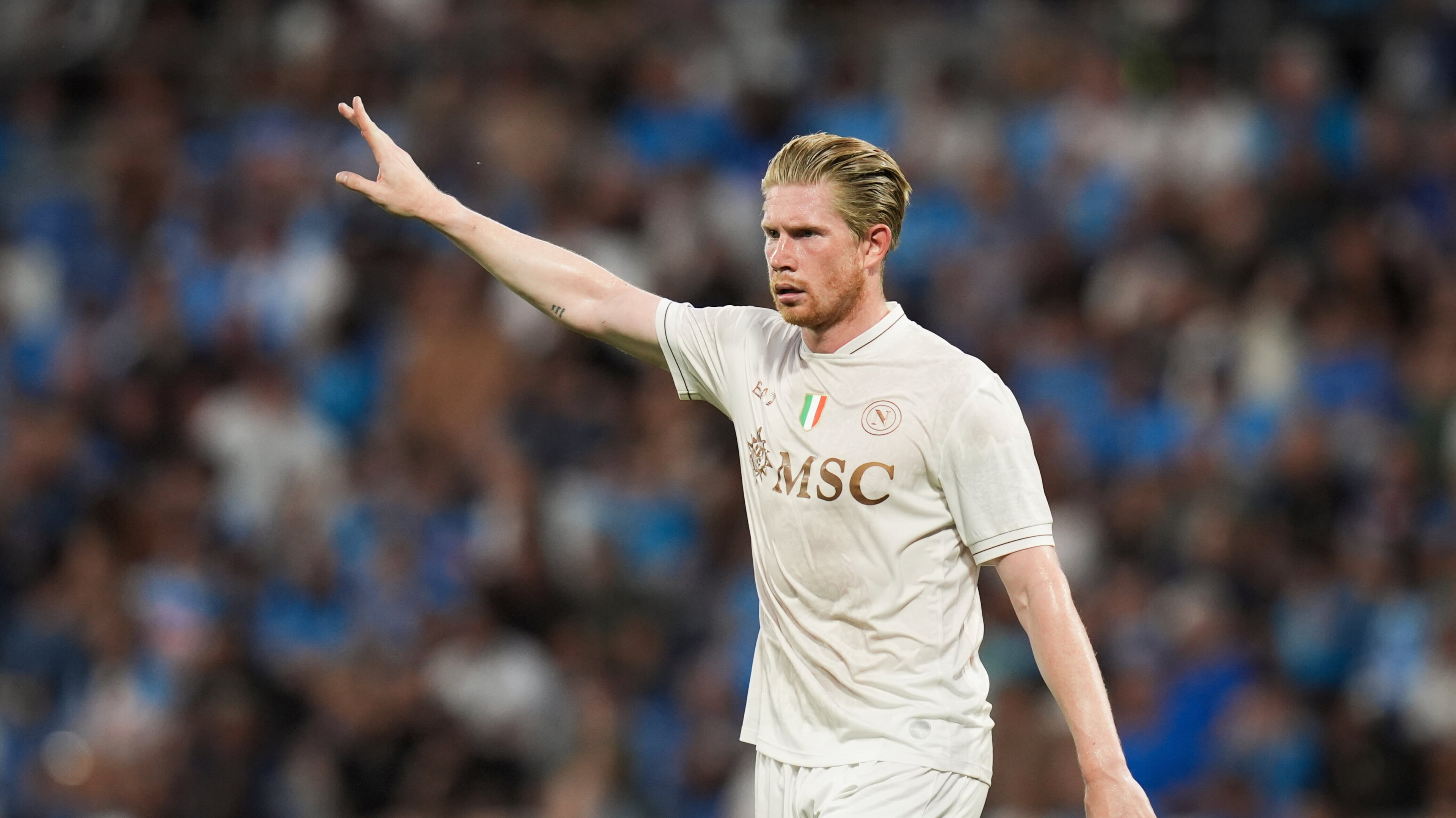 Napoli's Kevin De Bruyne shouts instructions to his teammates during the Serie A soccer match between Sassuolo and Napoli at the Mapei Stadium Città del Tricolore in Reggio Emilia, Italy, on Saturday, August 23, 2025. (Massimo Paolone/LaPresse via AP)