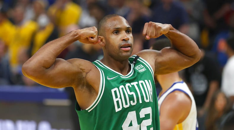 Boston Celtics center Al Horford (42) celebrates during the second half of Game 1 of basketball's NBA Finals against the Golden State Warriors in San Francisco, Thursday, June 2, 2022. (AP Photo/Jed Jacobsohn)