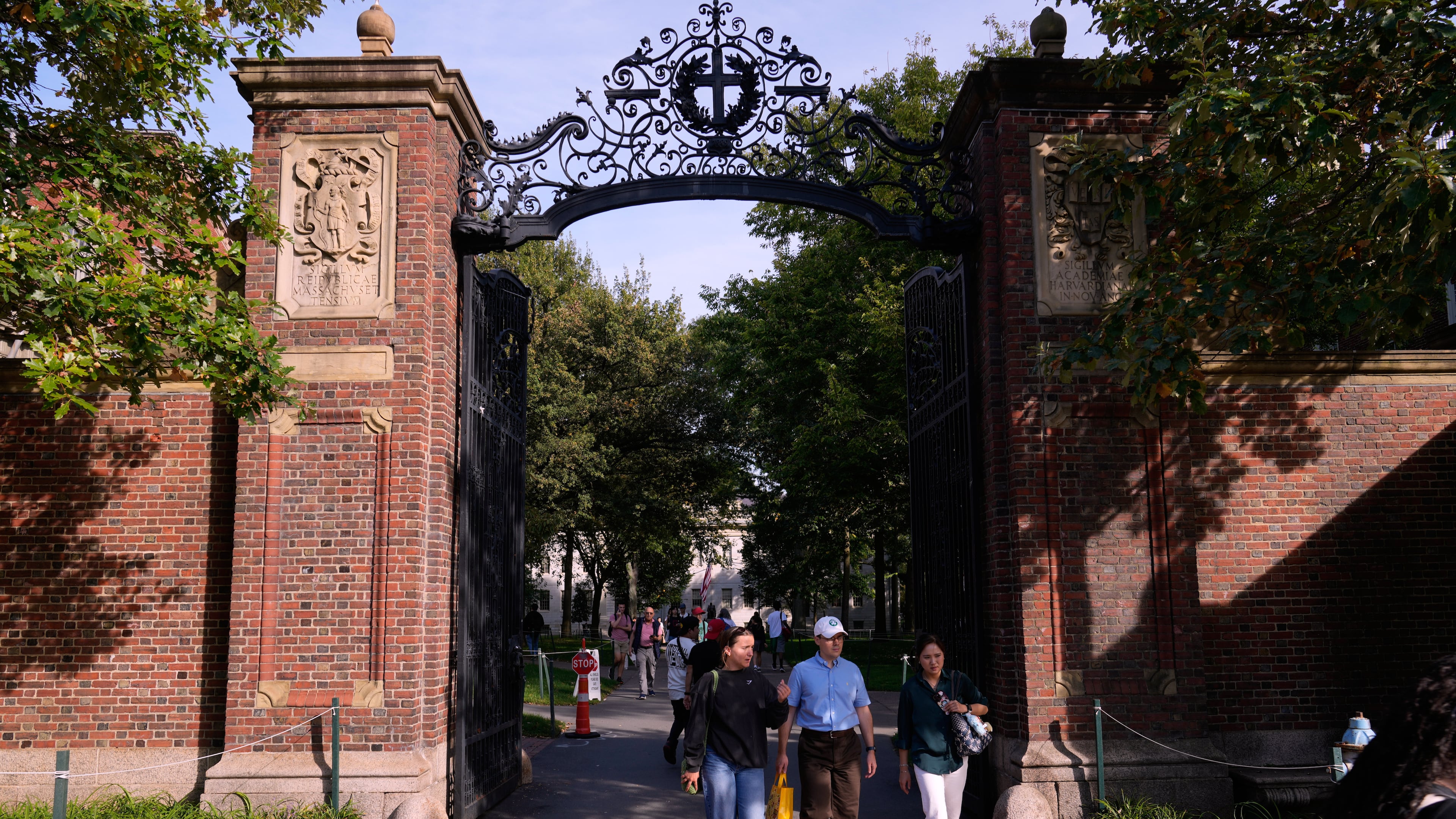 FILE - The gates of Harvard Yard at Harvard University, Tuesday, Sept. 30, 2025, in Cambridge, Mass. (AP Photo/Charles Krupa, File)
