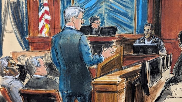 FILE - Defense attorney Brian Steel, center, cross examines Kid Cudi, far right, as Sean "Diddy" Combs, far left, looks on during Combs' sex trafficking and racketeering trial in Manhattan federal court, May 22, 2025, in New York. (Elizabeth Williams via AP, File)