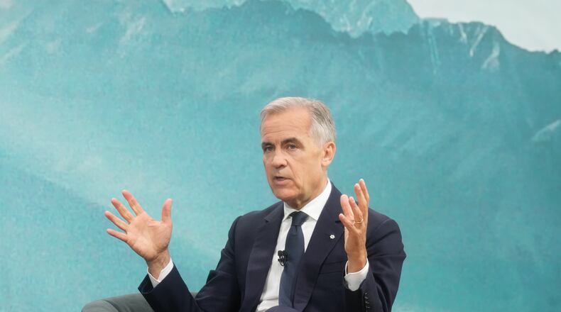 Prime Minister Mark Carney speaks during a fireside chat with the Chief Executive Officer of PSP Investments, Deborah Orida, in Toronto, on Tuesday, Sept. 15, 2026. (Nathan Denette /The Canadian Press via AP)