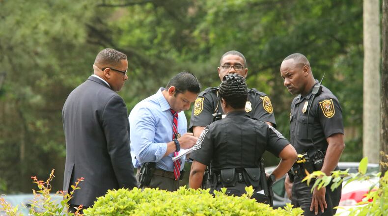 DeKalb County police are investigating a fatal shooting this morning at an apartment complex near I-20. JOHN SPINK/JSPINK@AJC.COM