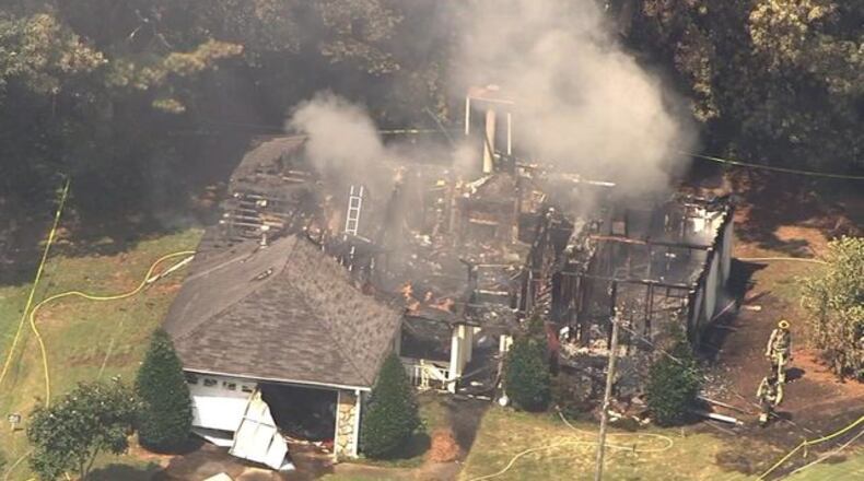 A home in Lawrenceville collapsed during a Wednesday afternoon fire.