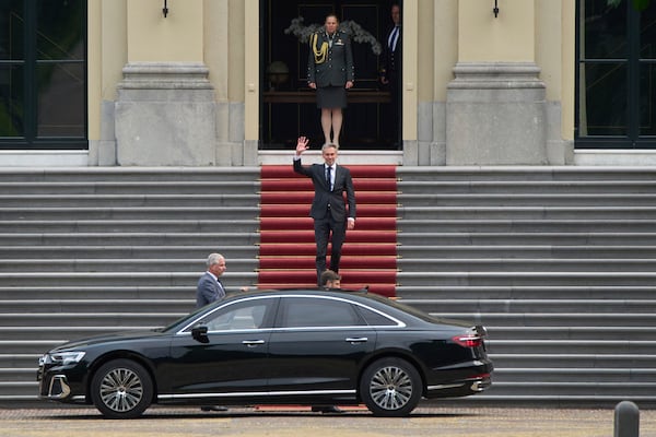 Dutch Prime Minister Dick Schoof waves after handing in the resignation of Geert Wilder's PVV party ministers to King Willem-Alexander at royal palace Huis ten Bosch in The Hague, Netherlands, Tuesday, June 3, 2025. (AP Photo/Peter Dejong)