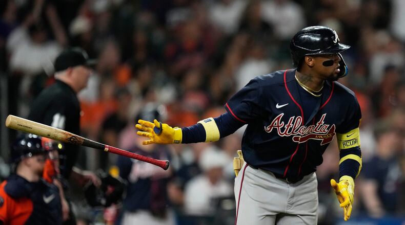 Atlanta Braves' Ronald Acuña Jr. tosses his bat after hitting a home run during the seventh inning of a baseball game against the Houston Astros in Houston, Friday, Sept. 18, 2026. (Ashley Landis/AP)