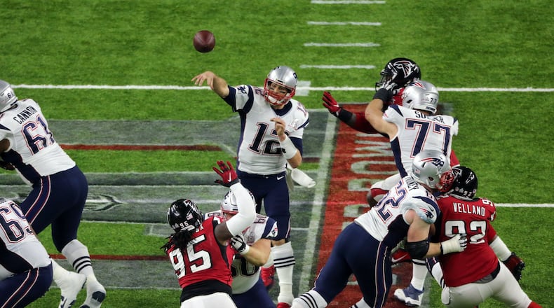 New England Patriots quarterback Tom Brady (12) passes against the Atlanta Falcons in Super Bowl LI at NRG Stadium on Sunday,  Feb. 5, 2017.