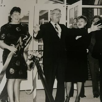 From left: Anita Farley (Georgia Ensemble co-founder and managing director), former Roswell Mayor William Lee "Pug" Mabry and Robert Farley (Georgia Ensemble co-founder and artistic director) attend the ribbon cutting ceremony for Georgia Ensemble Theatre in 1992 at the Roswell Cultural Arts Center. (Courtesy of Laurel Farley Crowe)
