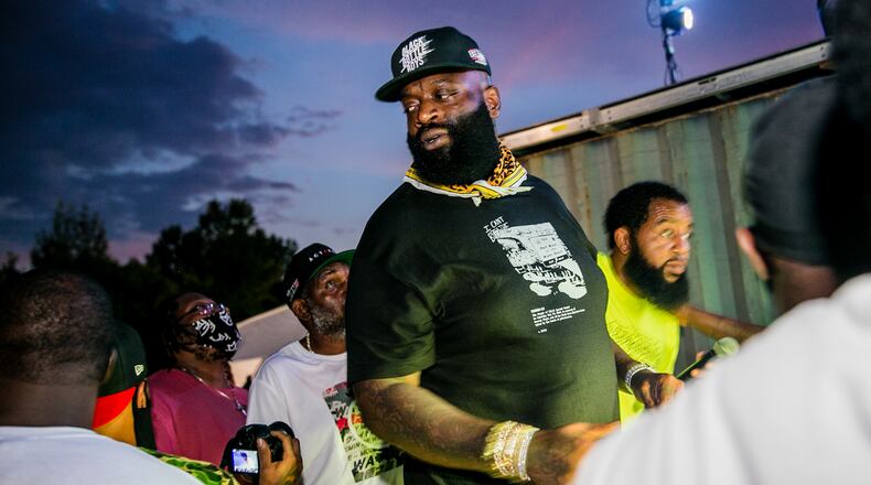 Rapper Rick Ross performed at a drive-in concert in Atlanta in June. He's set to headline a get-out-the-vote rally in Atlanta on Jan. 3. (Jenni Girtman for The Atlanta Journal-Constitution)