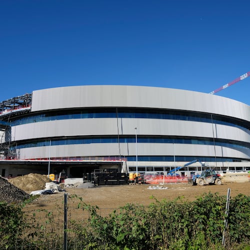 FILE - An outside view of the Santa Giulia Ice Hockey Arena, in Milan, where Ice Hockey discipline of the Milan Cortina 2026 Winter Olympics will take place Italy, Friday, Oct. 24, 2025. (AP Photo/Luca Bruno, File)