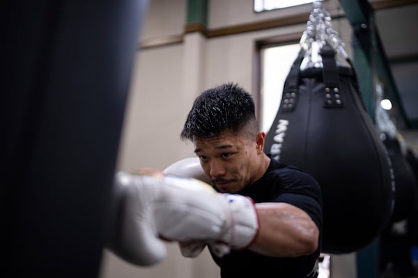 Junto Nakatani trains at a gym in Sagamihara City, Kanagawa Prefecture, Tuesday, July 1, 2025. (AP Photo/Louise Delmotte)