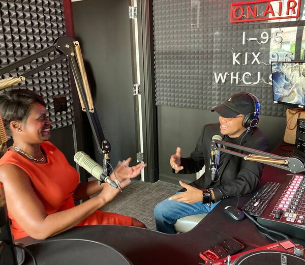 Dr. Sametria McFall, interim provost and vice president of academic affairs at Savannah State, checks out the new, state-of-the-art studio equipment with radio host and Savannah State TV program director, William Martin.