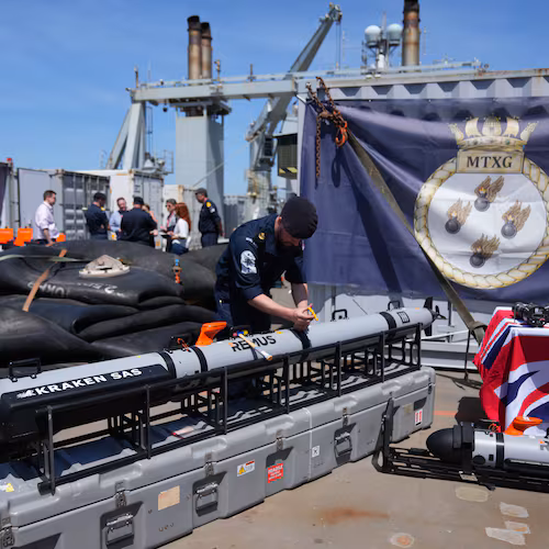 UK Royal Navy personnel inspect autonomous vehicles with sonar sensor that can detect and identify mines, on RFA Lyme Bay in territory of Gibraltar, on Friday, May 22, 2026. (AP Photo/Kwiyeon Ha)