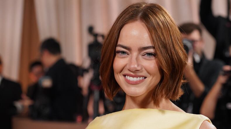 Emma Stone arrives at the 83rd Golden Globes on Sunday, Jan. 11, 2026, at the Beverly Hilton in Beverly Hills, Calif. (Photo by Jordan Strauss/Invision/AP)