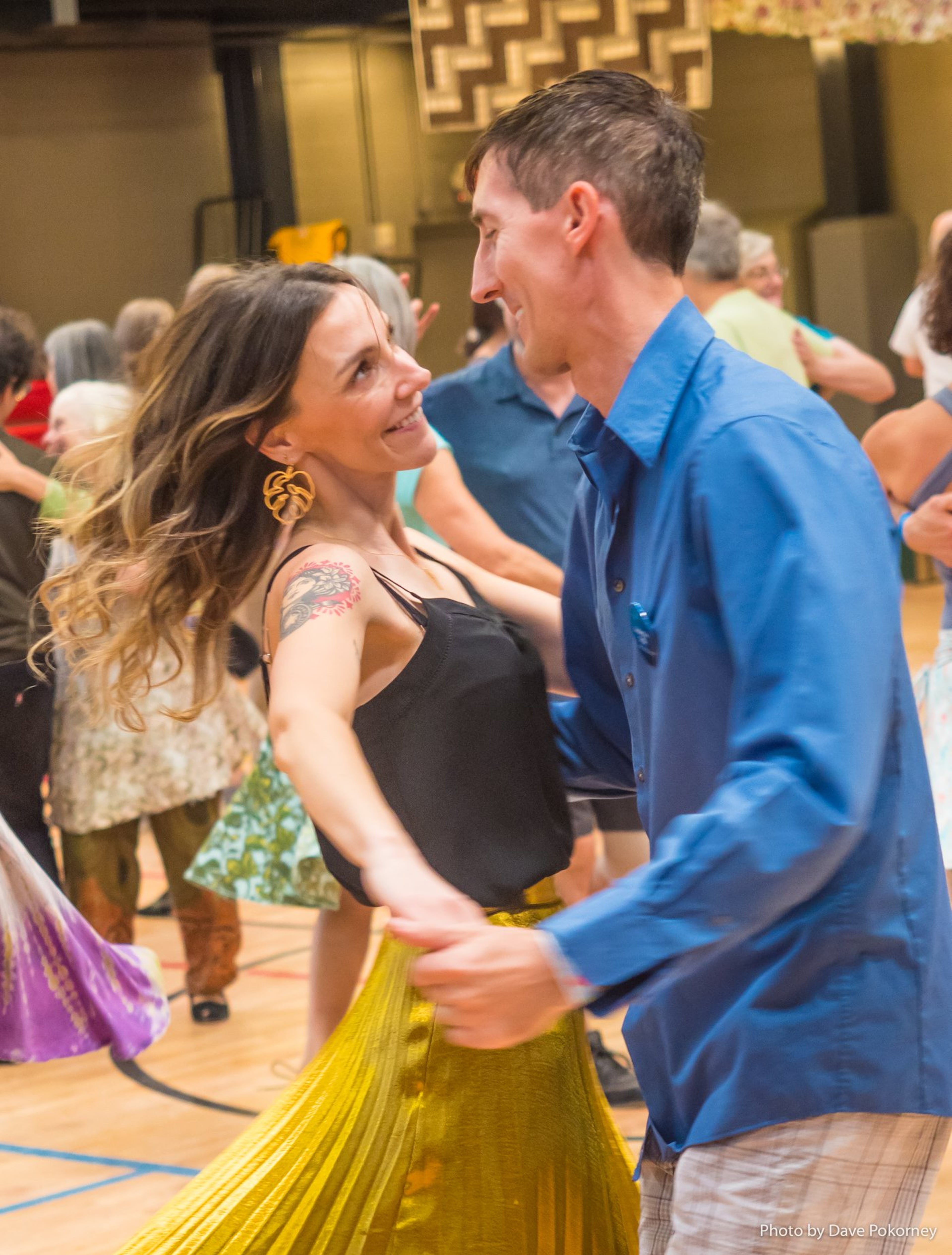 Erin Margate Dorman (left) and Nathan Cox at a contra dance in 2019. (Courtesy of Dave Pokorney)