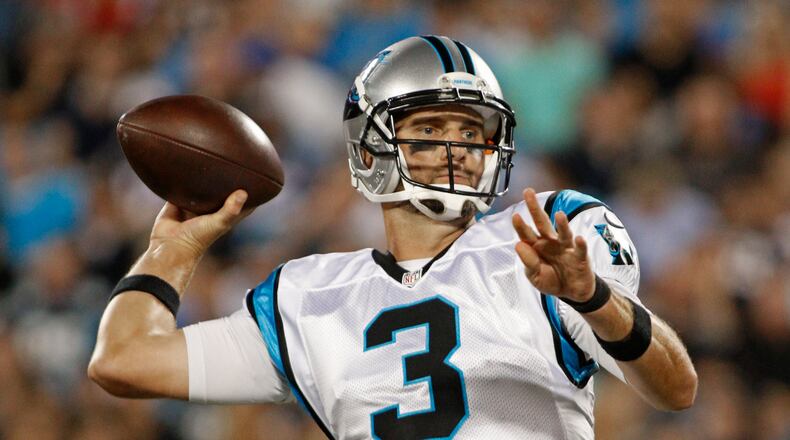 Carolina Panthers' Derek Anderson (3) looks to pass against the New England Patriots during the second half of a preseason NFL football game in Charlotte, N.C., Friday, Aug. 28, 2015. (AP Photo/Bob Leverone)