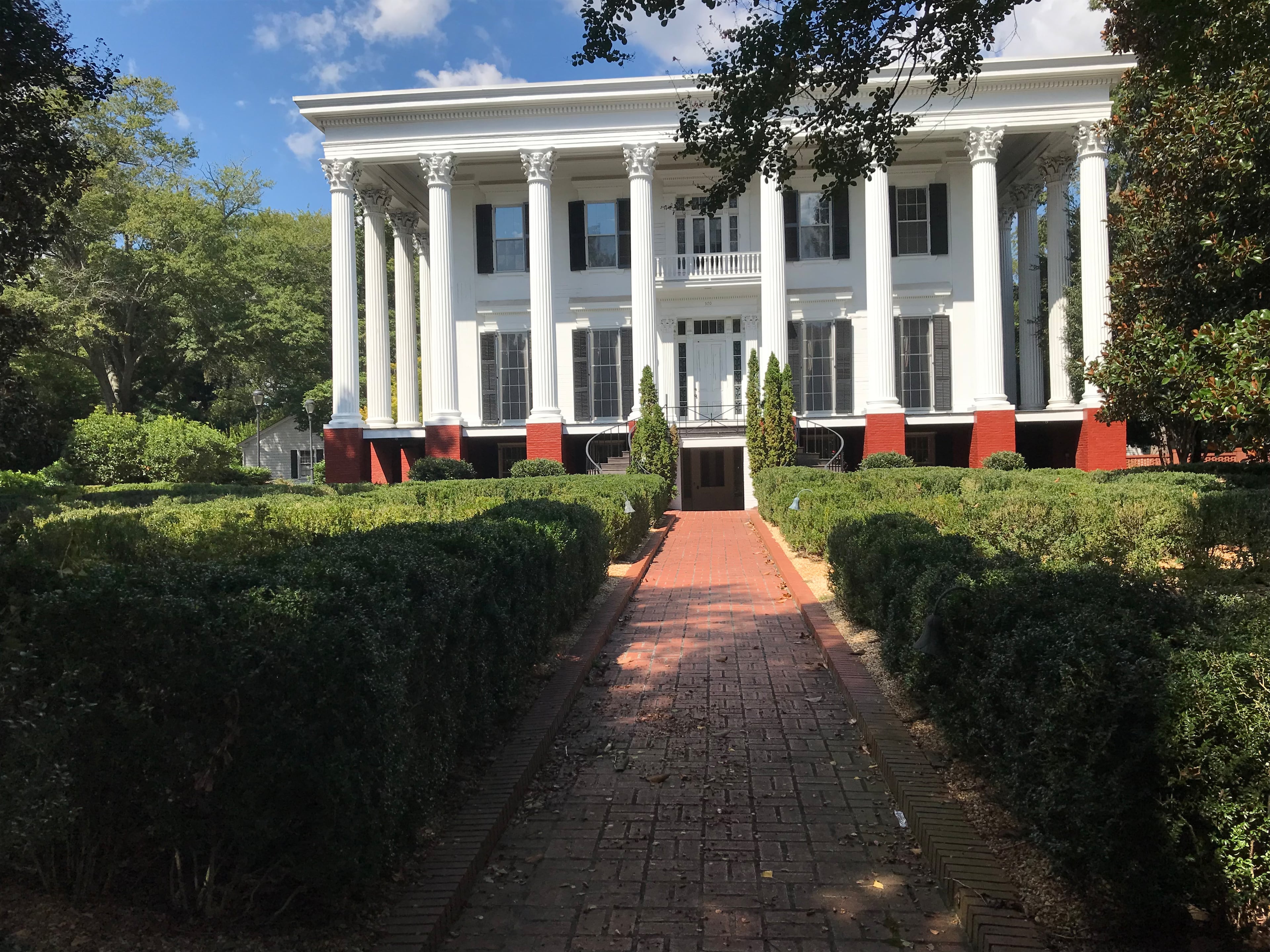 The President's House, a 19th-century mansion, as viewed from Prince Avenue, in Athens, Georgia. (Rebecca McCarthy for the AJC)