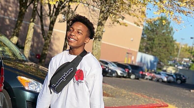 This July 16, 2019 photo provided by Jarena McDavid, shows her son, Ka'Mar Benbo, a 12-year-old African American boy, in Portland, Ore. The mother of Benbo, now 13, filed a $300,000 lawsuit Thursday, June 18, 2020, saying three sheriff's deputies near Portland pinned him to the ground, one by pressing a knee on his neck, outside a suburban mall after the 12-year-old witnessed a fight and was walking away. In an emailed statement, Sheriff Craig Roberts disputed the allegations and said an investigation did not find any evidence that a deputy placed a knee on the boy's neck. (Jarena McDavid via AP)
