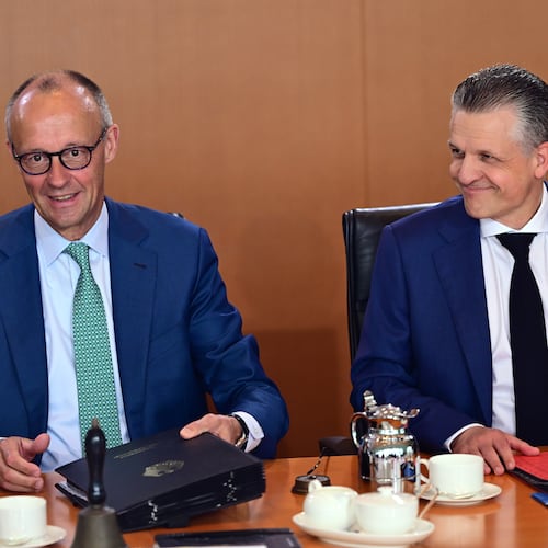 German Chancellor Friedrich Merz, left, and Thorsten Frei, Head of the Federal Chancellery and Federal Minister for Special Tasks attend the cabinet meeting at the chancellery in Berlin, Germany, Wednesday, July 22, 2026. (Sebastian Gollnow/dpa via AP)