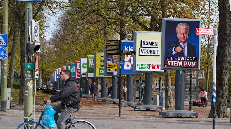 Election billboards of 26 of the 27 political parties participating in the Oct. 29 general elections are lined up in The Hague, Netherlands, Wednesday, Oct. 22, 2025. (AP Photo/Peter Dejong)