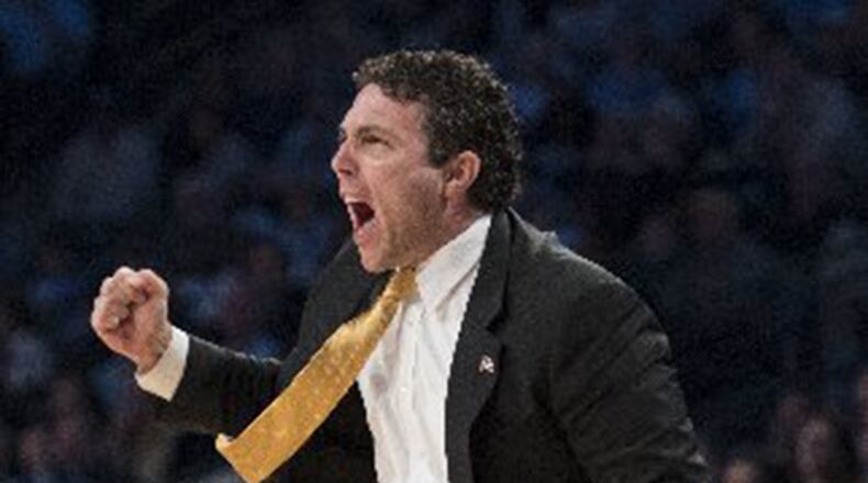 Georgia Tech coach Josh Pastner had reason to be excited Saturday after the Jackets' upset of North Carolina. (AP photo)