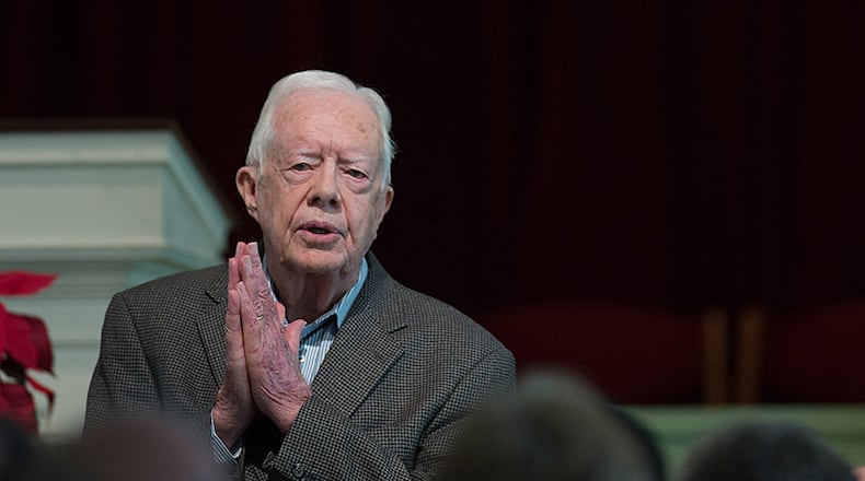 Former President Jimmy Carter teaches during Sunday School class at Maranatha Baptist Church in his hometown, Sunday, Dec. 13, 2015, in Plains, Ga. A recent MRI showing no cancer on Jimmy Carter's brain is "very positive" news for the former president but will not end his medical treatment, doctors said. Carter, 91, announced on Dec. 6 that doctors found no evidence of the four lesions discovered on his brain this summer and no signs of new cancer growth. (AP Photo/Branden Camp)