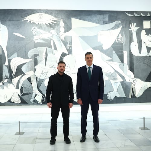 In this photo provided by the Spanish government, Ukrainian President Volodymyr Zelenskyy poses with Spain's Prime Minister Pedro Sánchez in front of Pablo Picasso's "Guernica" in Madrid Tuesday, Nov. 18, 2025. (Spanish government via AP)