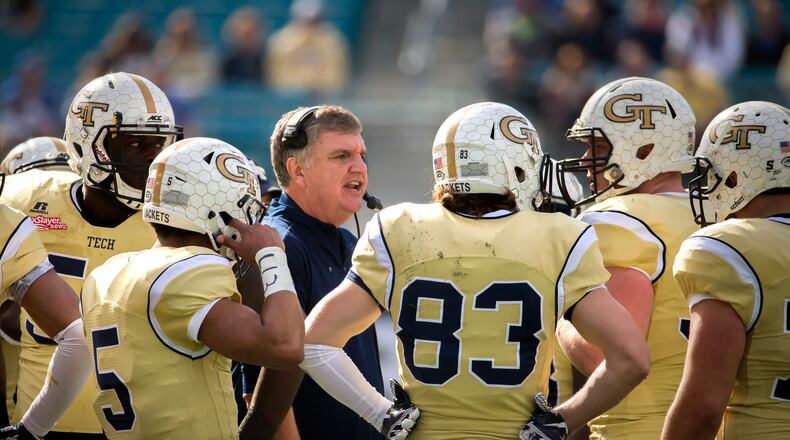 Georgia Tech head coach Paul Johnson talks to his players during the first half of the TaxSlayer Bowl NCAA college football game against Kentucky, Saturday, Dec. 31, 2016, in Jacksonville, Fla. (AP Photo/Stephen B. Morton)