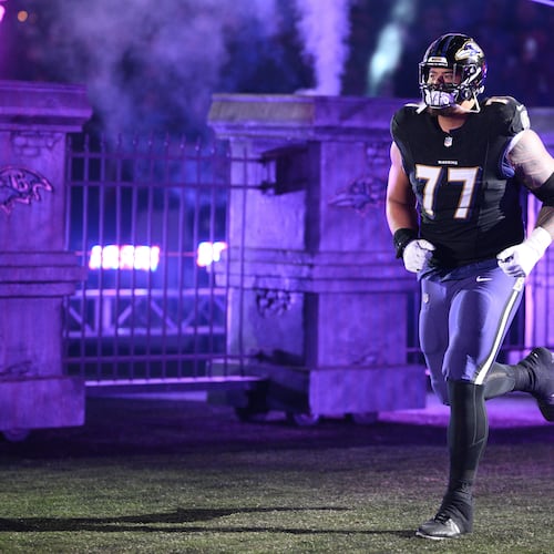 FILE - Baltimore Ravens guard Daniel Faalele (77) takes to the field before an NFL football game against the New England Patriots, Sunday, Dec. 21, 2025, in Baltimore. (AP Photo/Nick Wass, file)