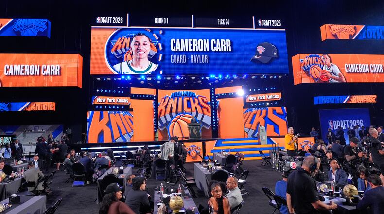 in the first round of the NBA basketball draft, Tuesday, June 23, 2026, in New York. (AP Photo/Yuki Iwamura)