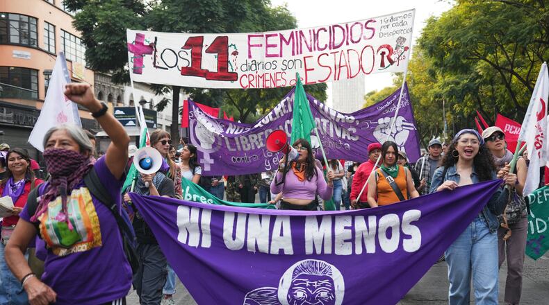 Demonstrators attend a protest marking International Day for the Elimination of Violence Against Women in Mexico City, Tuesday, Nov. 25, 2025. (AP Photo/Claudia Rosel)