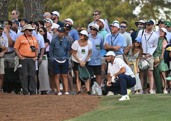 Scottie Scheffler follows his shot from the 15th fairway during the final round of the Masters at Augusta National Golf Club, Sunday, April 12, 2026, in Augusta, Ga. (Hyosub Shin/AJC)