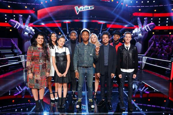 DIXSON (fourth from left) was part of team Pharrell Williams (center) from season nine of NBC's "The Voice." (Trae Patton/NBC)