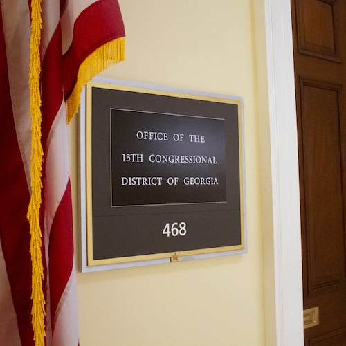 The sign for the office of the 13th Congressional District of Georgia in the Cannon House Office Building is photographed July 20, 2026, on Capitol Hill in Washington. (AP Photo/Tallulah Brown Van Zee)