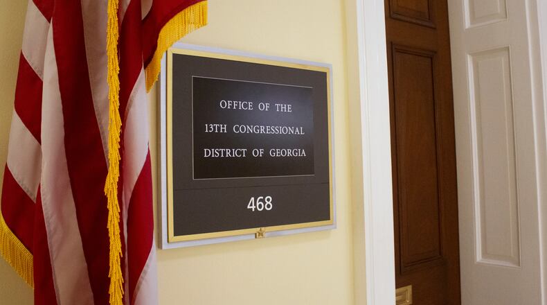 The sign for the office of the 13th Congressional District of Georgia in the Cannon House Office Building is photographed July 20, 2026, on Capitol Hill in Washington. (AP Photo/Tallulah Brown Van Zee)