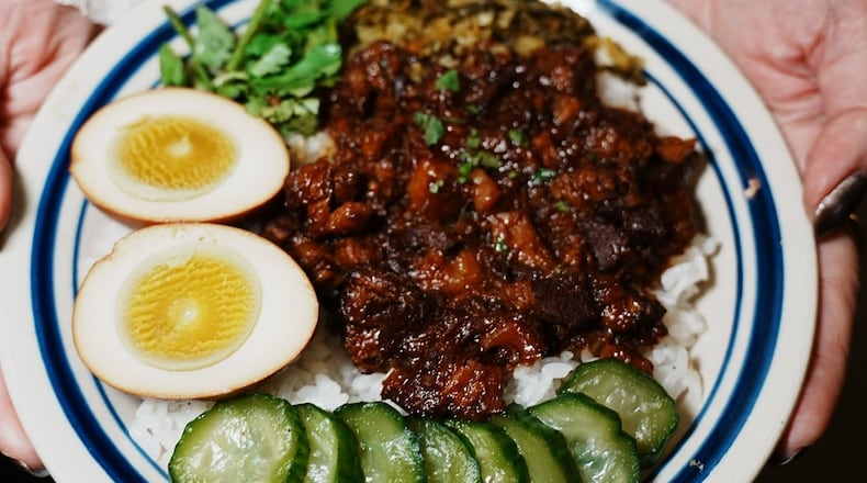 The classic Taiwanese dish lu rou fan (braised pork belly over rice) is one of the recommended menu items at Lucky Star. (Courtesy of Ching Yao Wang/Lucky Star)