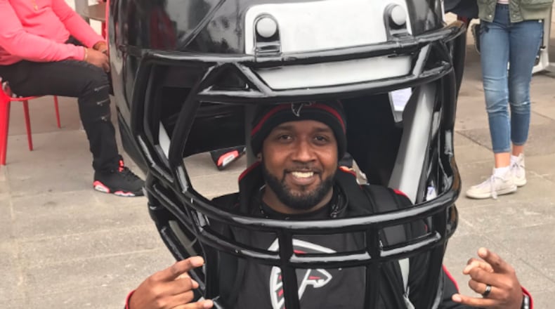 This Atlanta fan is getting a big head before the game.