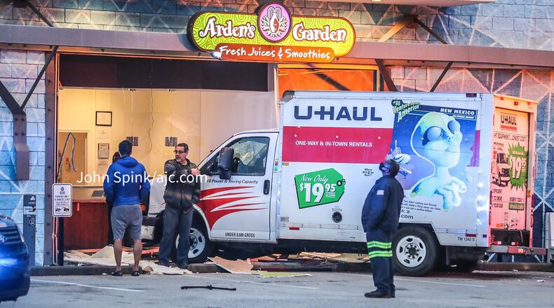 Atlanta police said burglars trying to access a high-end boutique on Marietta Street smashed a U-Haul through a juice store next door.