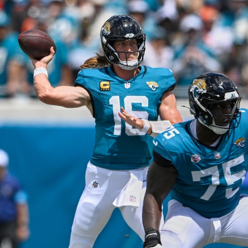 Jacksonville Jaguars quarterback Trevor Lawrence (16) passes in the first half of an NFL football game against the Cleveland Browns, Sunday, Sept. 13, 2026, in Jacksonville. (AP Photo/Phelan M. Ebenhack)