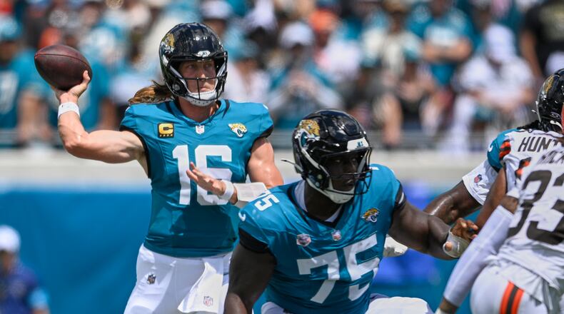 Jacksonville Jaguars quarterback Trevor Lawrence (16) passes in the first half of an NFL football game against the Cleveland Browns, Sunday, Sept. 13, 2026, in Jacksonville. (AP Photo/Phelan M. Ebenhack)
