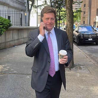 FILE - Acting U.S. Attorney for the Southern District of New York Jay Clayton talks on a phone as he exits court in New York, May 19, 2025. (AP Photo/Ted Shaffrey, File)
