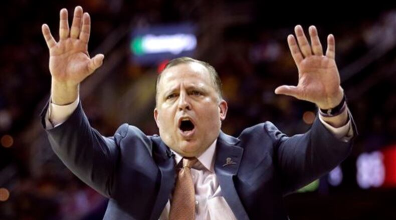 FILE - In this April 5, 2015, file photo, Chicago Bulls head coach Tom Thibodeau directs his players during the fourth quarter of an NBA basketball game against the Cleveland Cavaliers in Cleveland. A person with knowledge of the situation tells The Associated Press Wednesday, April 20, 2016, that the Minnesota Timberwolves have opened negotiations with the former Bulls coach to be the team's new coach and president of basketball operations. (AP Photo/Tony Dejak, File)