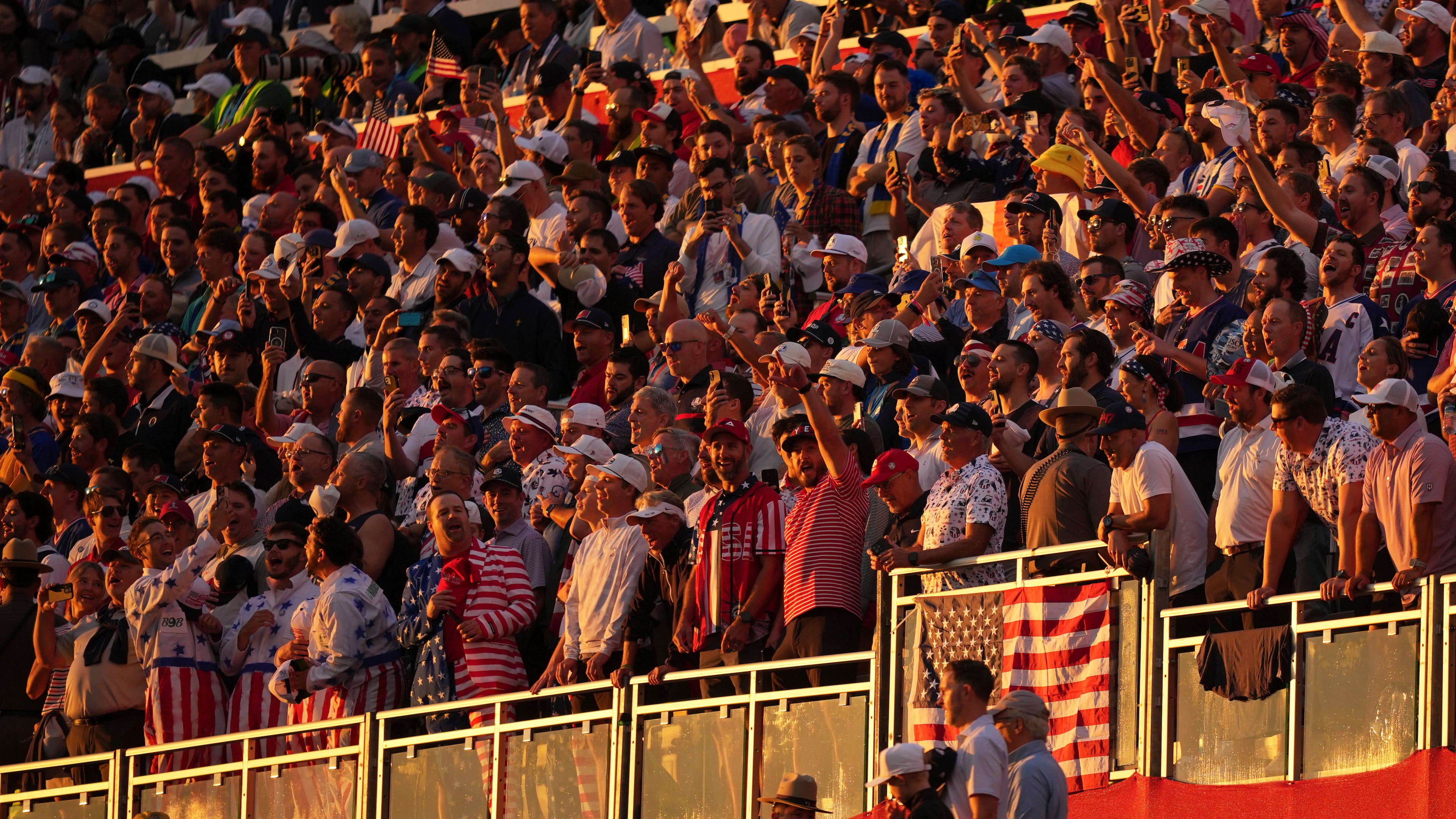Fans wait for the start on the first hole at Bethpage Black golf course during the Ryder Cup golf tournament, Friday, Sept. 26, 2025, in Farmingdale, N.Y. (AP Photo/Matt Slocum)